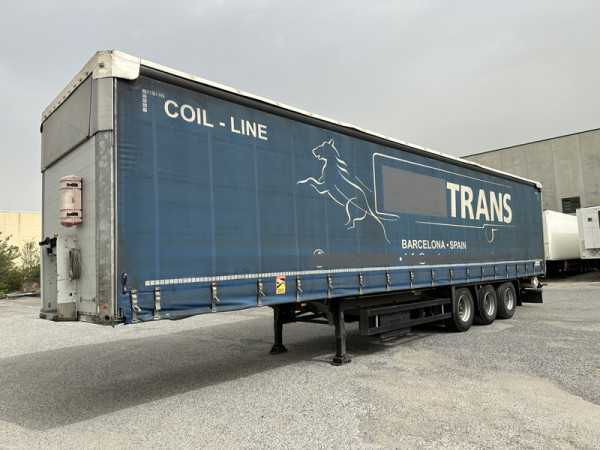 Schmitz Cargobull sliding tarp semi-trailer with coil carrier